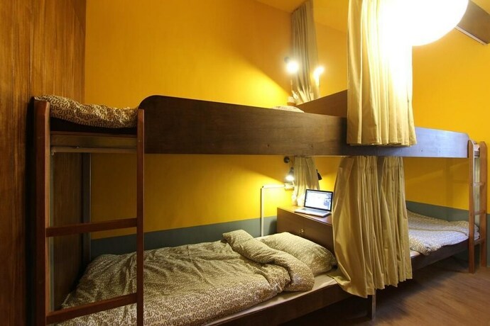 Imagen de la habitación del Hotel Rainbow Wave Surfing Hostel. Foto 6