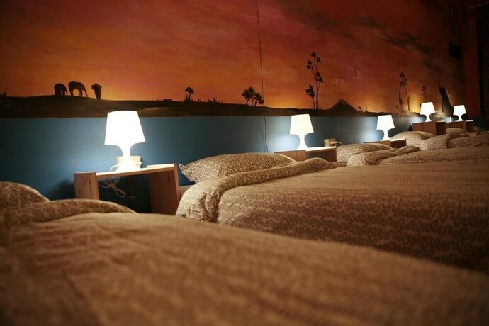 Imagen de la habitación del Hotel Rainbow Wave Surfing Hostel. Foto 7