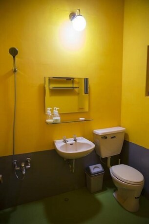 Imagen de la habitación del Hotel Rainbow Wave Surfing Hostel. Foto 12