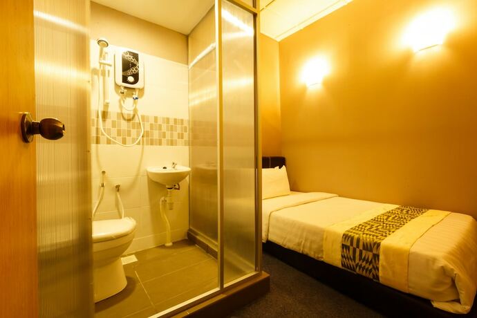 Imagen de la habitación del Hotel Rainforest Budget Stay. Foto 7