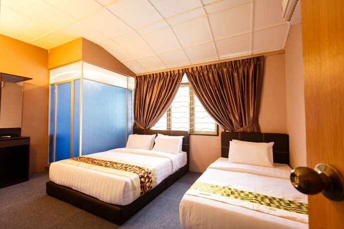 Imagen de la habitación del Hotel Rainforest Budget Stay. Foto 8