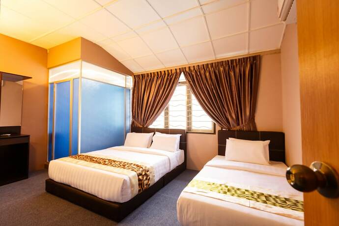 Imagen de la habitación del Hotel Rainforest Budget Stay. Foto 10