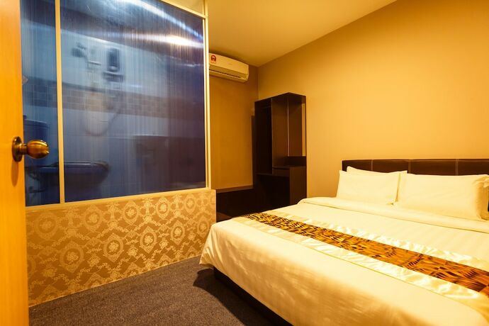 Imagen de la habitación del Hotel Rainforest Budget Stay. Foto 12