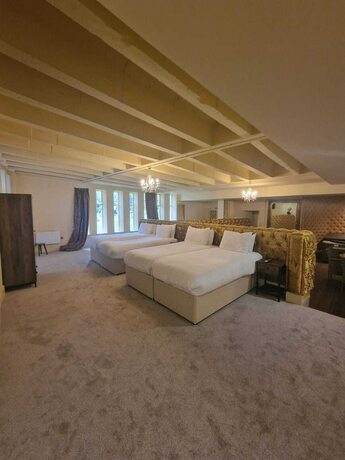 Imagen de la habitación del Hotel Rainhill Hall. Foto 12