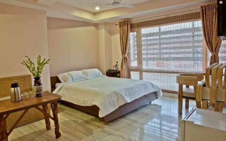 Imagen de la habitación del Hotel Rains Inn. Foto 16