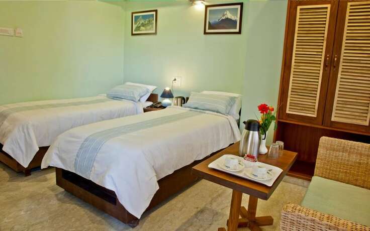 Imagen de la habitación del Hotel Rains Inn. Foto 17
