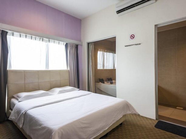 Imagen de la habitación del Hotel Raintree. Foto 2