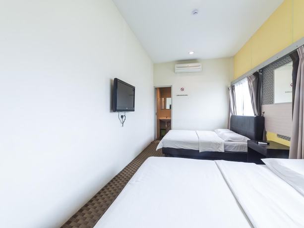 Imagen de la habitación del Hotel Raintree. Foto 3