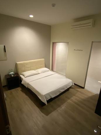 Imagen de la habitación del Hotel Raintree. Foto 4