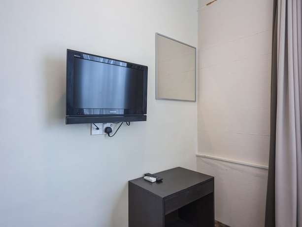 Imagen de la habitación del Hotel Raintree. Foto 6