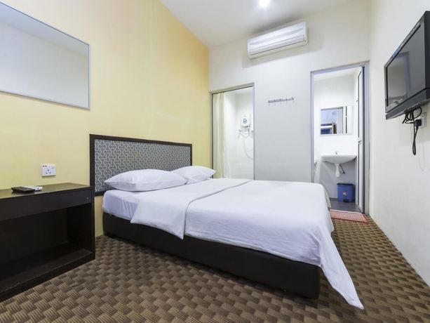 Imagen de la habitación del Hotel Raintree. Foto 8