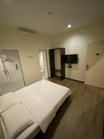 Imagen de la habitación del Hotel Raintree. Foto 10
