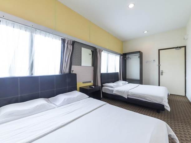 Imagen de la habitación del Hotel Raintree. Foto 11