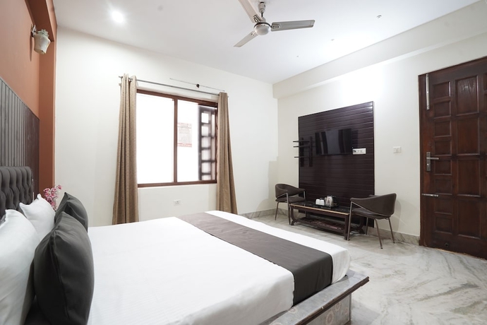 Imagen de la habitación del Hotel Raj Mahal, Gurugram. Foto 5