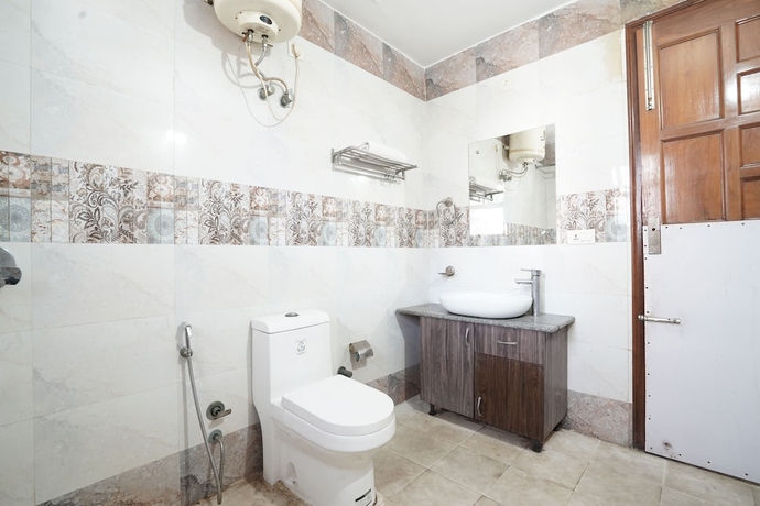 Imagen de la habitación del Hotel Raj Mahal, Gurugram. Foto 10
