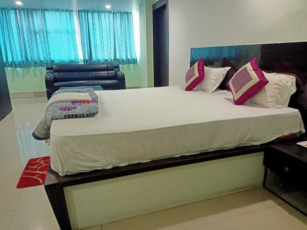 Imagen de la habitación del Hotel Raj Mahal Rooms and Banquet Hall. Foto 12