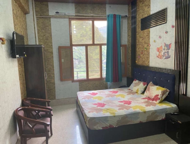 Imagen de la habitación del Hotel Raj Palace, Badrinath. Foto 6