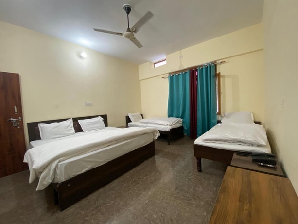 Imagen de la habitación del Hotel Raj Palace, Badrinath. Foto 10