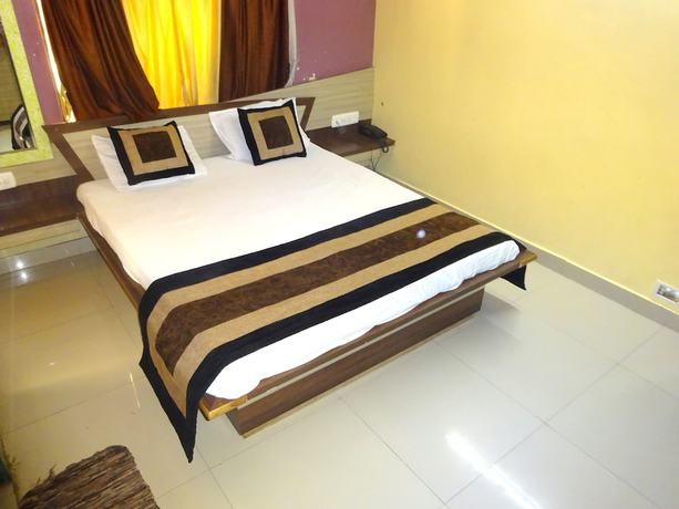 Imagen de la habitación del Hotel Raj Palace by Sky Stays. Foto 7