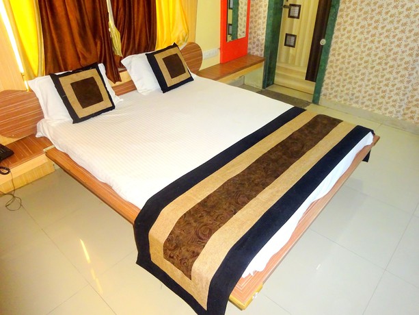 Imagen de la habitación del Hotel Raj Palace by Sky Stays. Foto 11