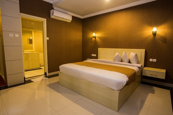 Imagen de la habitación del Hotel Raja Residence. Foto 17