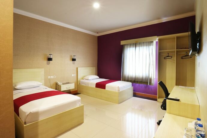 Imagen de la habitación del Hotel Raja Residence. Foto 18