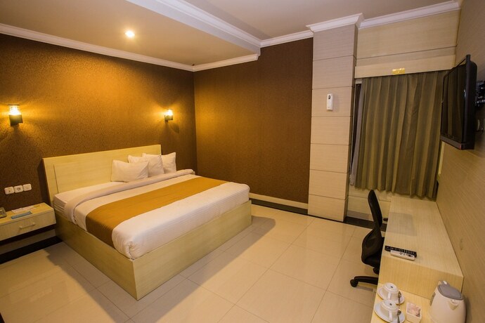Imagen de la habitación del Hotel Raja Residence. Foto 19