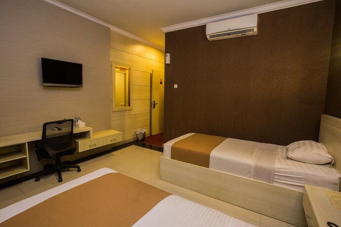Imagen de la habitación del Hotel Raja Residence. Foto 20