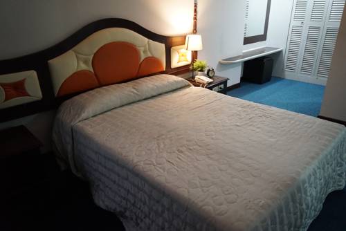 Imagen de la habitación del Hotel Rajah. Foto 9