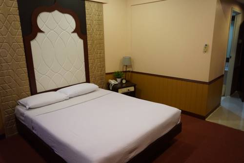 Imagen de la habitación del Hotel Rajah. Foto 12