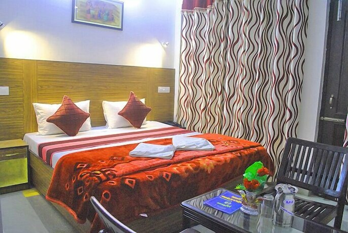 Imagen de la habitación del Hotel Raja's Palace. Foto 30