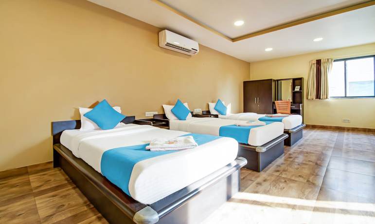 Imagen de la habitación del Hotel Rajdeep Inn. Foto 10