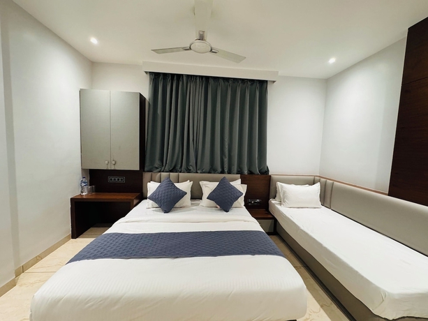 Imagen de la habitación del Hotel Rajdev INN. Foto 4