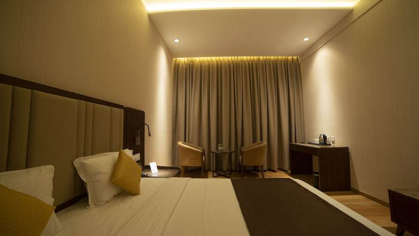 Imagen de la habitación del Hotel Rajhans Abhinandan. Foto 10
