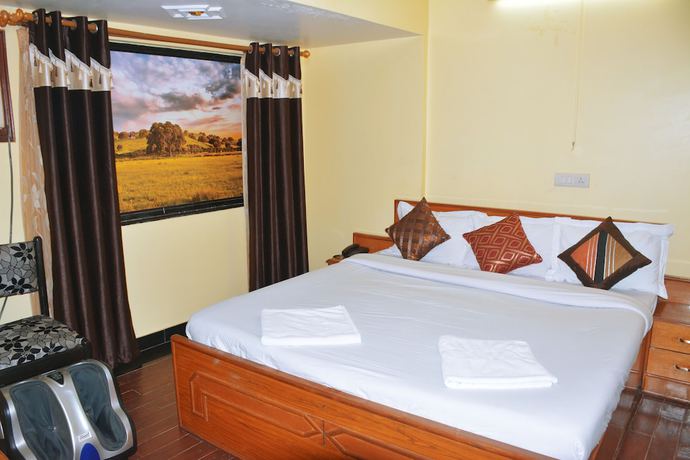 Imagen de la habitación del Hotel Rajhans International. Foto 7
