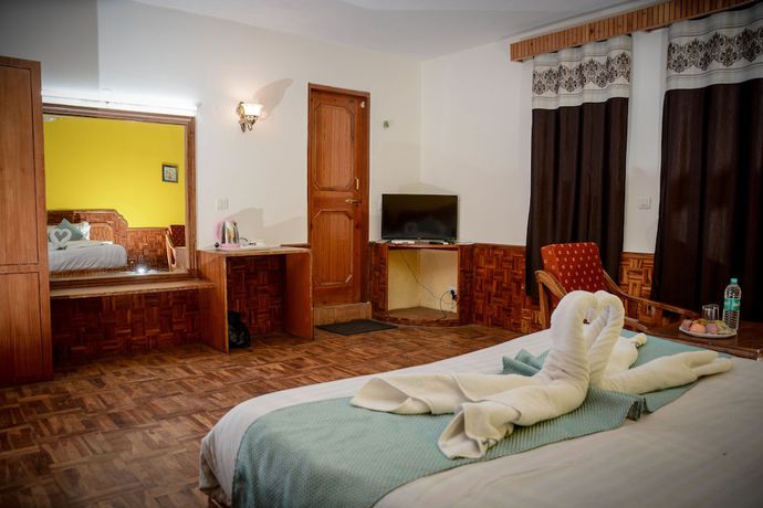 Imagen de la habitación del Hotel Rajhans Manali. Foto 9