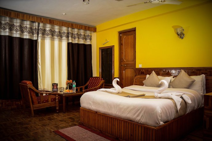 Imagen de la habitación del Hotel Rajhans Manali. Foto 13