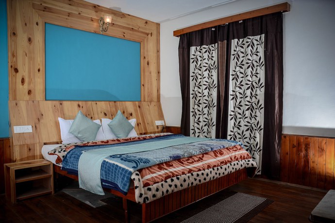 Imagen de la habitación del Hotel Rajhans Manali. Foto 14