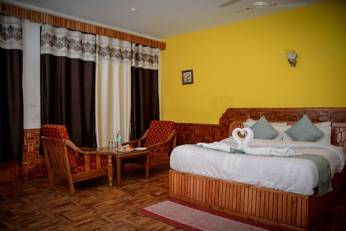 Imagen de la habitación del Hotel Rajhans Manali. Foto 17