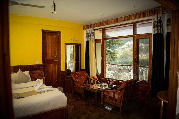 Imagen de la habitación del Hotel Rajhans Manali. Foto 18