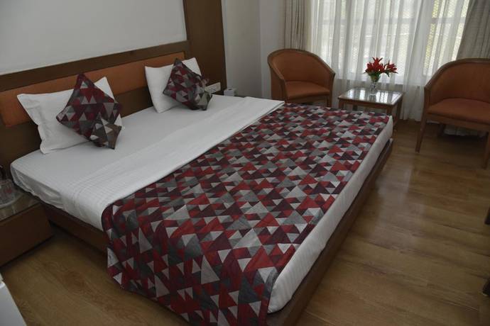 Imagen de la habitación del Hotel Rajhans Regent. Foto 13