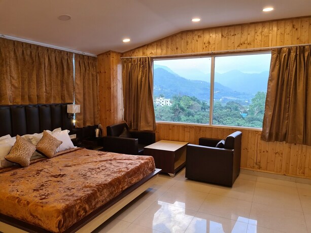 Imagen de la habitación del Hotel Rajpur Heights. Foto 19