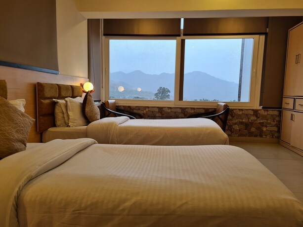 Imagen de la habitación del Hotel Rajpur Heights. Foto 23