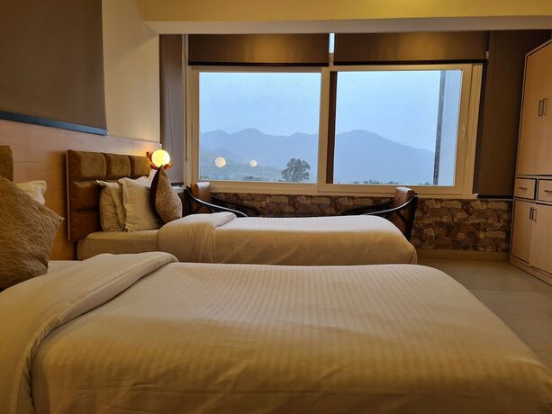 Imagen de la habitación del Hotel Rajpur Heights. Foto 25