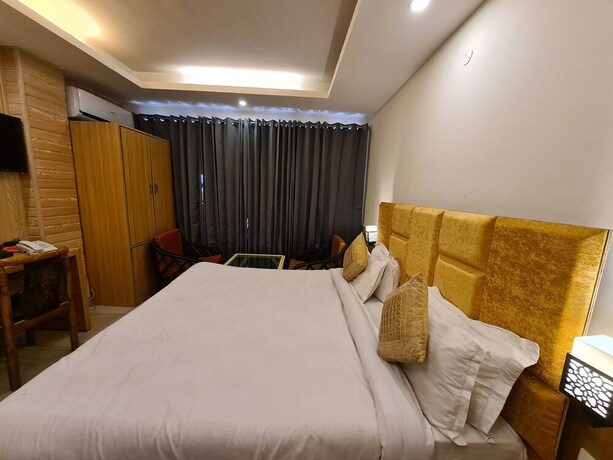 Imagen de la habitación del Hotel Rajpur Heights. Foto 26