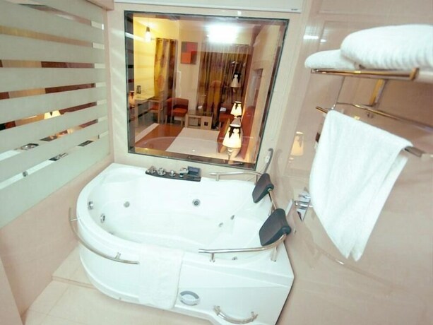 Imagen de la habitación del Hotel Rajshree, Chandigarh. Foto 18