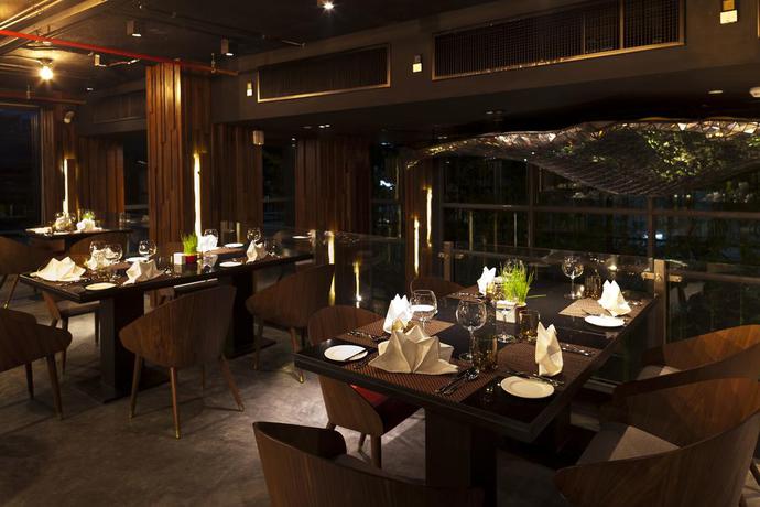 Imagen del bar/restaurante del Hotel RakYim Siam - Sukhumvit 15. Foto 4
