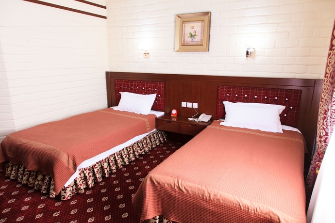 Imagen de la habitación del Hotel Rakat Plaza. Foto 6