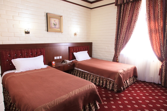 Imagen de la habitación del Hotel Rakat Plaza. Foto 7
