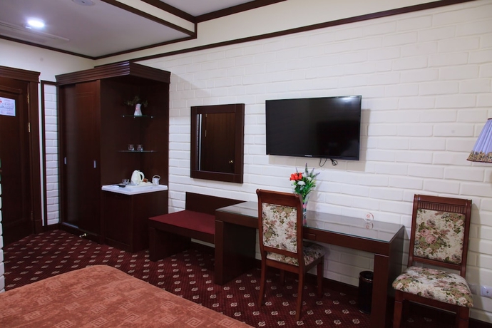 Imagen de la habitación del Hotel Rakat Plaza. Foto 11